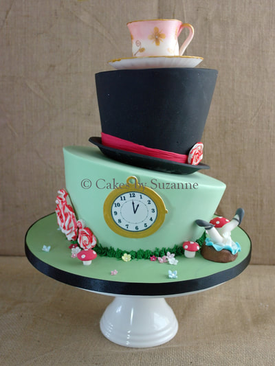 two tier round wonky Madhatter topsy turvy wedding cake Alice in Wonderland 