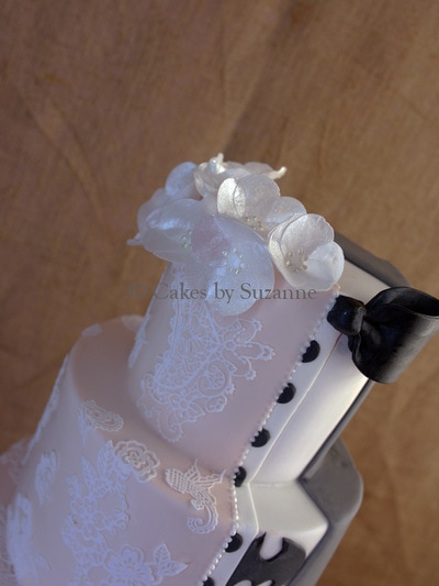 three tier split theme wedding outfit cake lace dress groom suit Batman