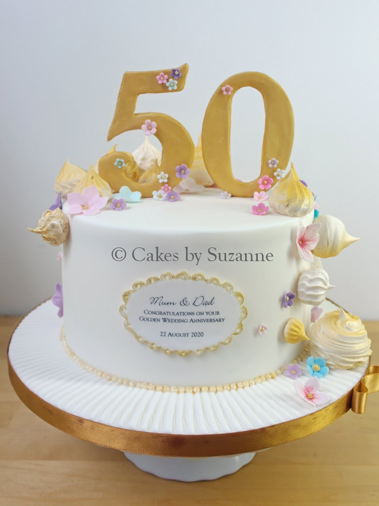 50th wedding anniversary cake golden meringues blossoms