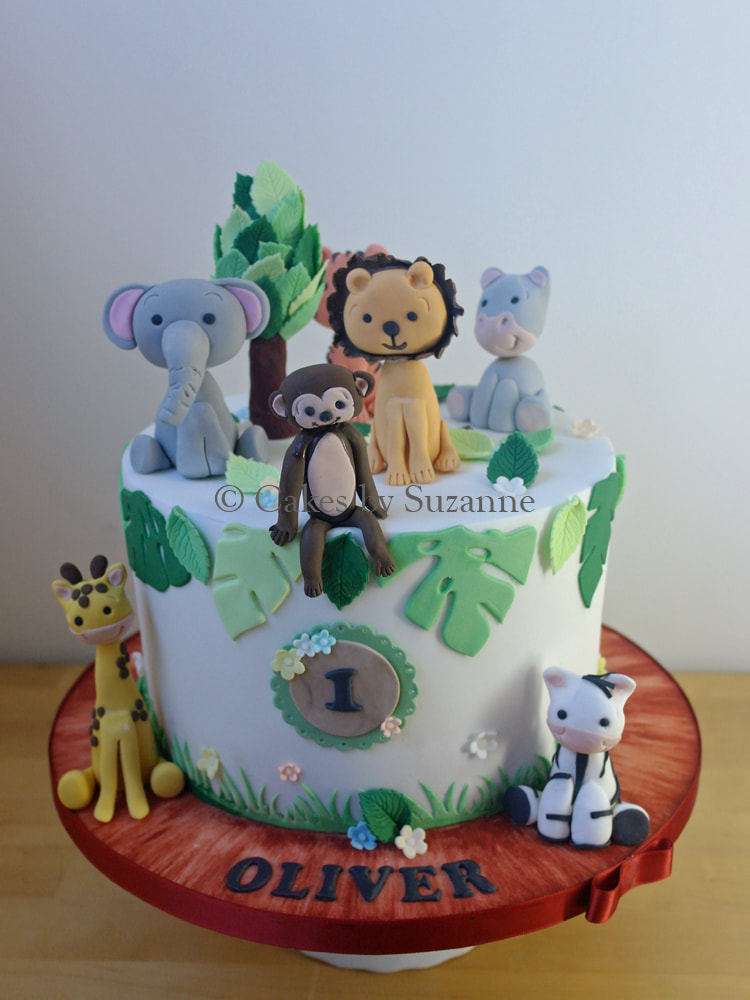 jungle animals first birthday cake