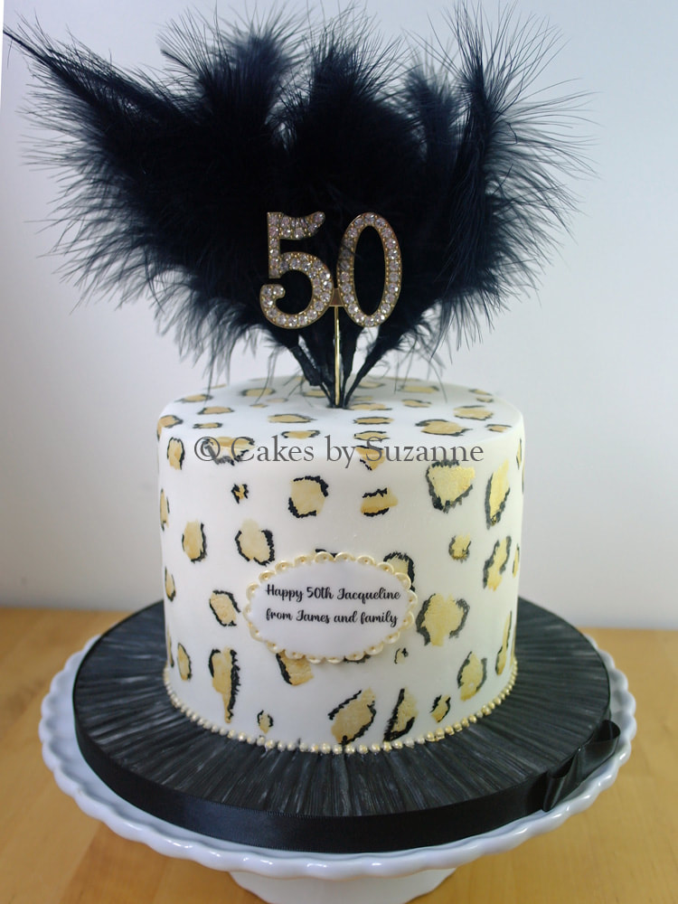 50th birthday round black gold ostrich feathers leopard print cake