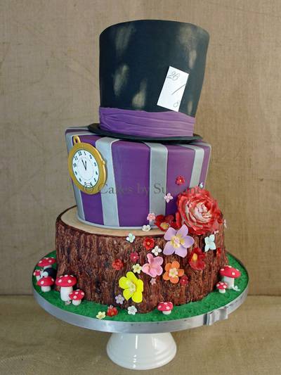 three tier wonky topsy turvy round Mad Hatter Alice in Wonderland wedding cake