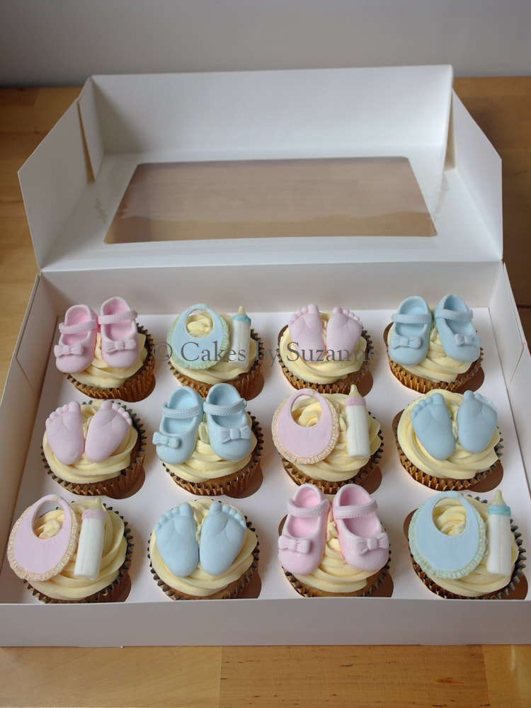baby shower cupcakes pink blue shoes bib bottle baby feet