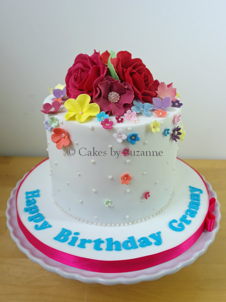 birthday cake with bright flowers