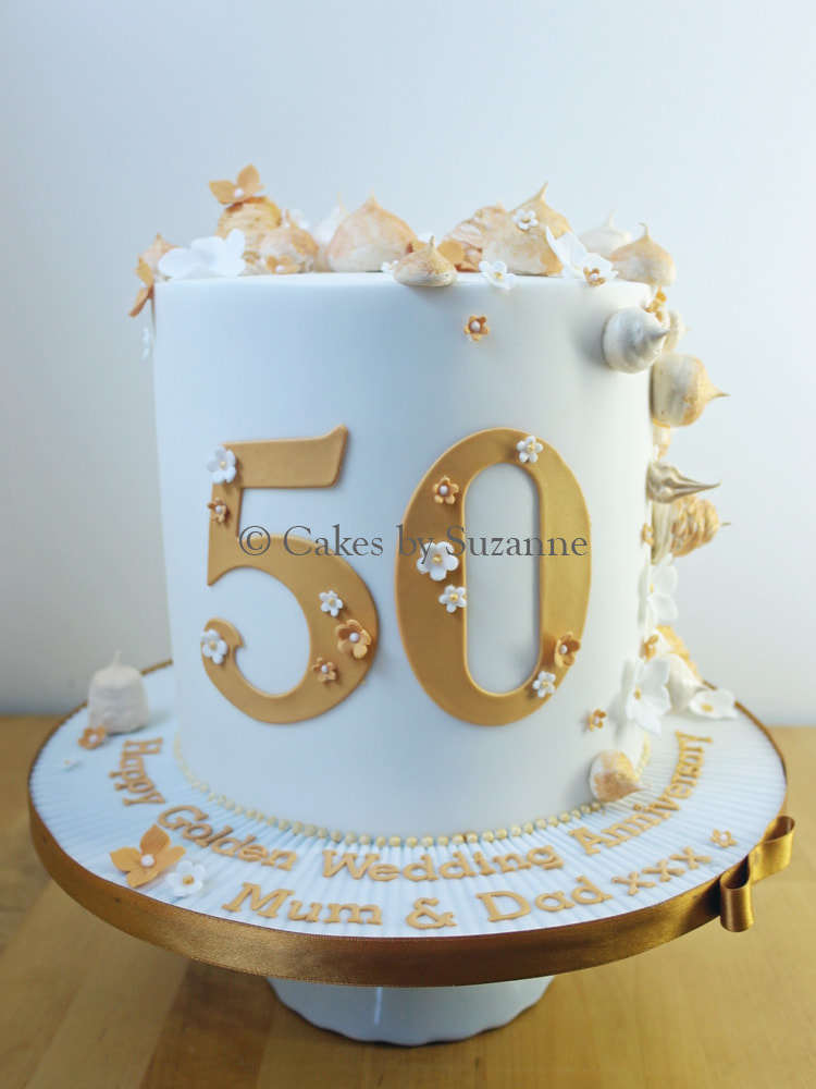 50th wedding anniversary cake gold meringues blossoms