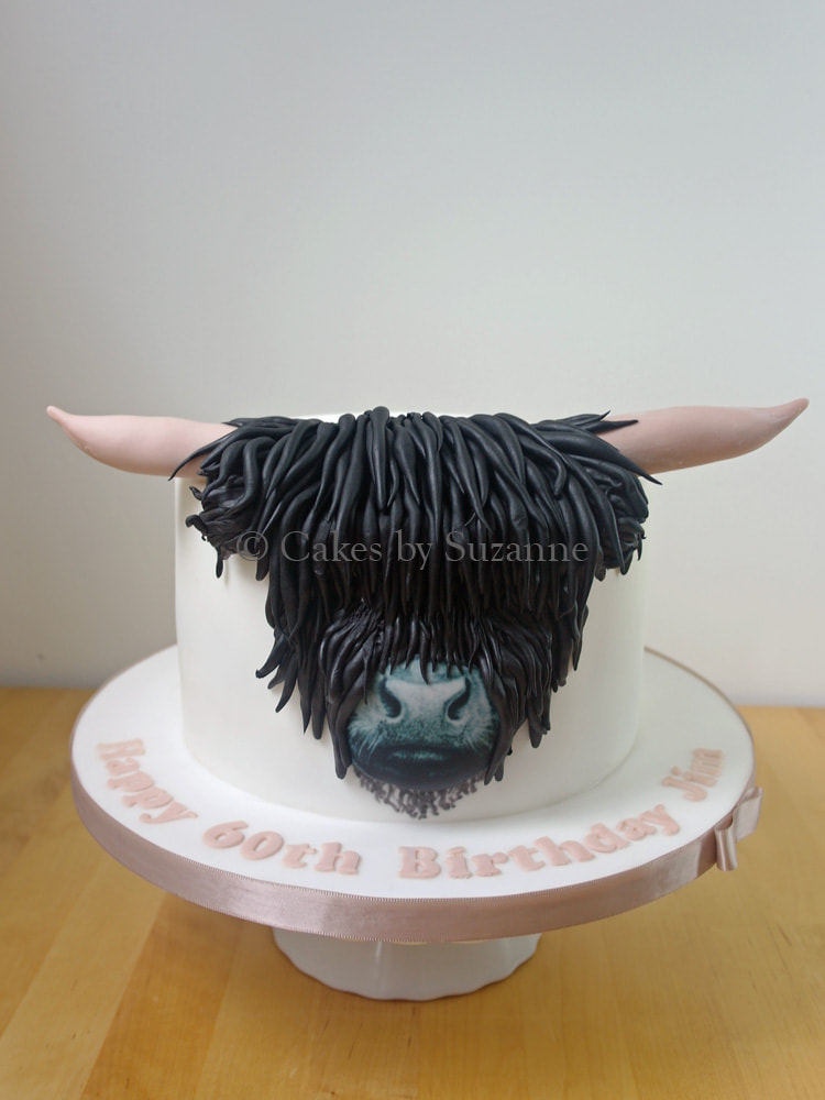 black Highland cow 60th birthday cake