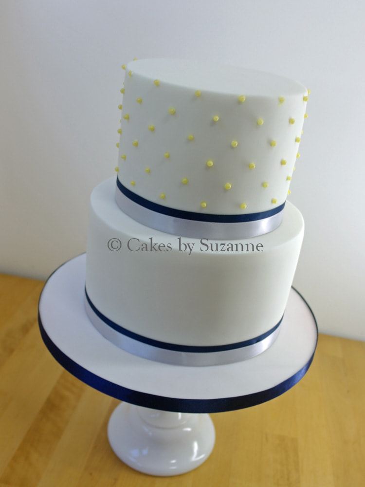 Last minute two tier round wedding cake with pearls and ribbon for you to add your own topper.
