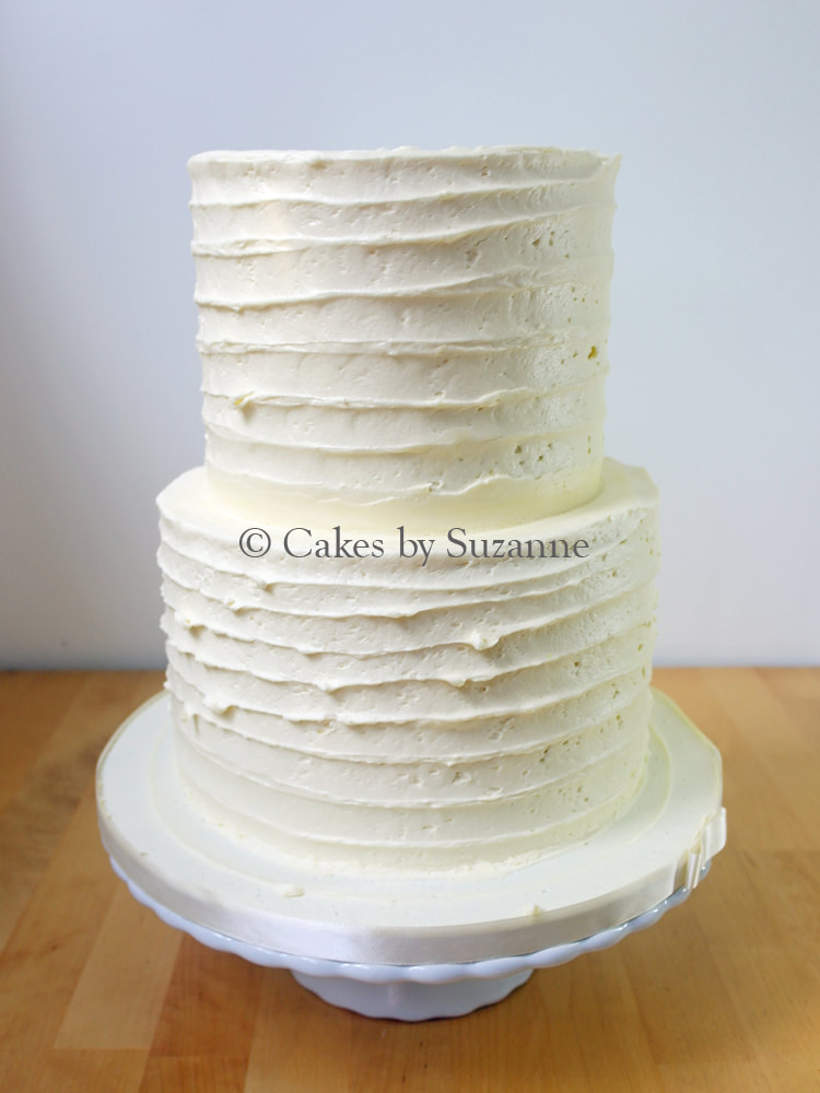 last minute two tier round buttercream wedding cake, plain for you to add your own topper or decoration.