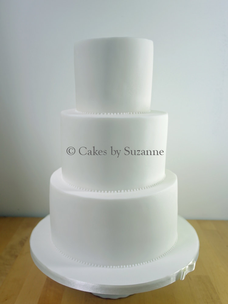 Last minute plain three tier round wedding cake for you to add your own topper or decoration.