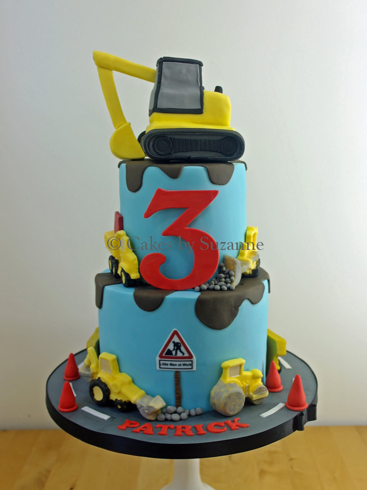 two tier round digger birthday cake construction