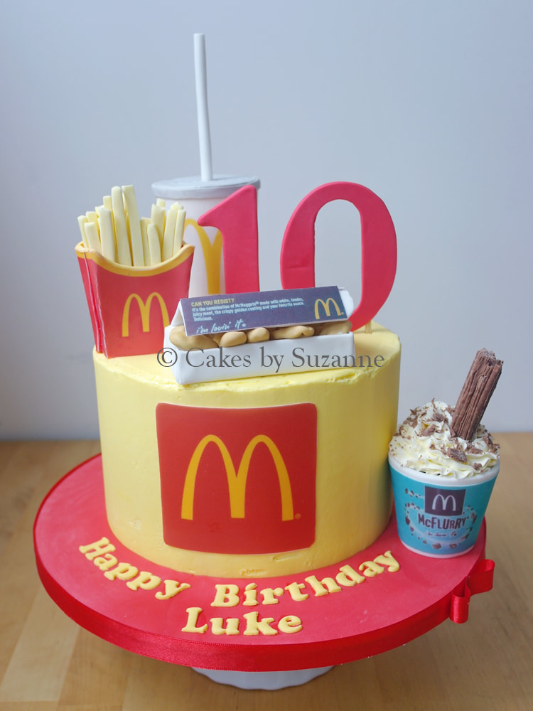 McDonalds themed 10th birthday cake with cake fries, drink, chicken nuggets and McFlurry with a flake
