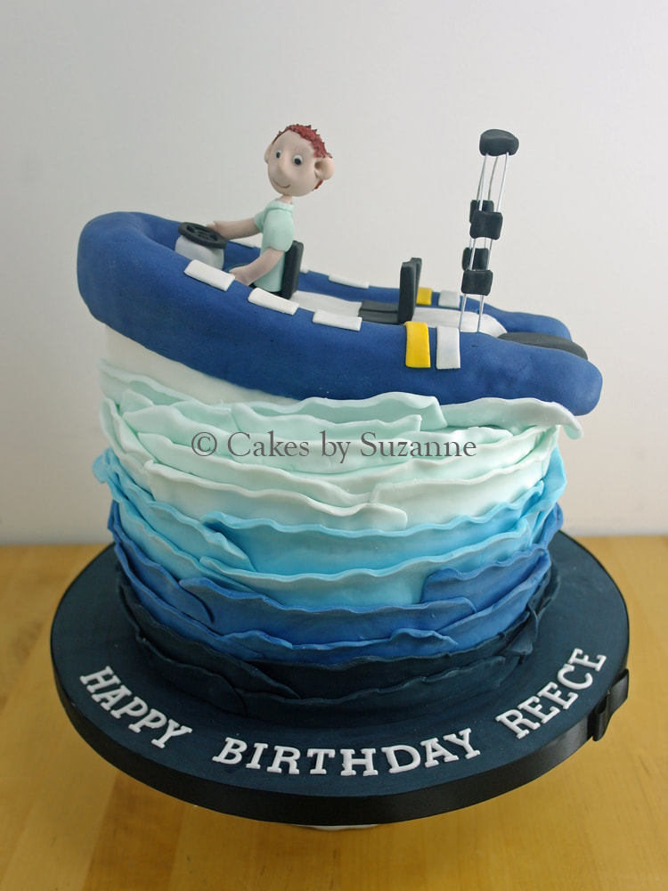 speedboat cake with model