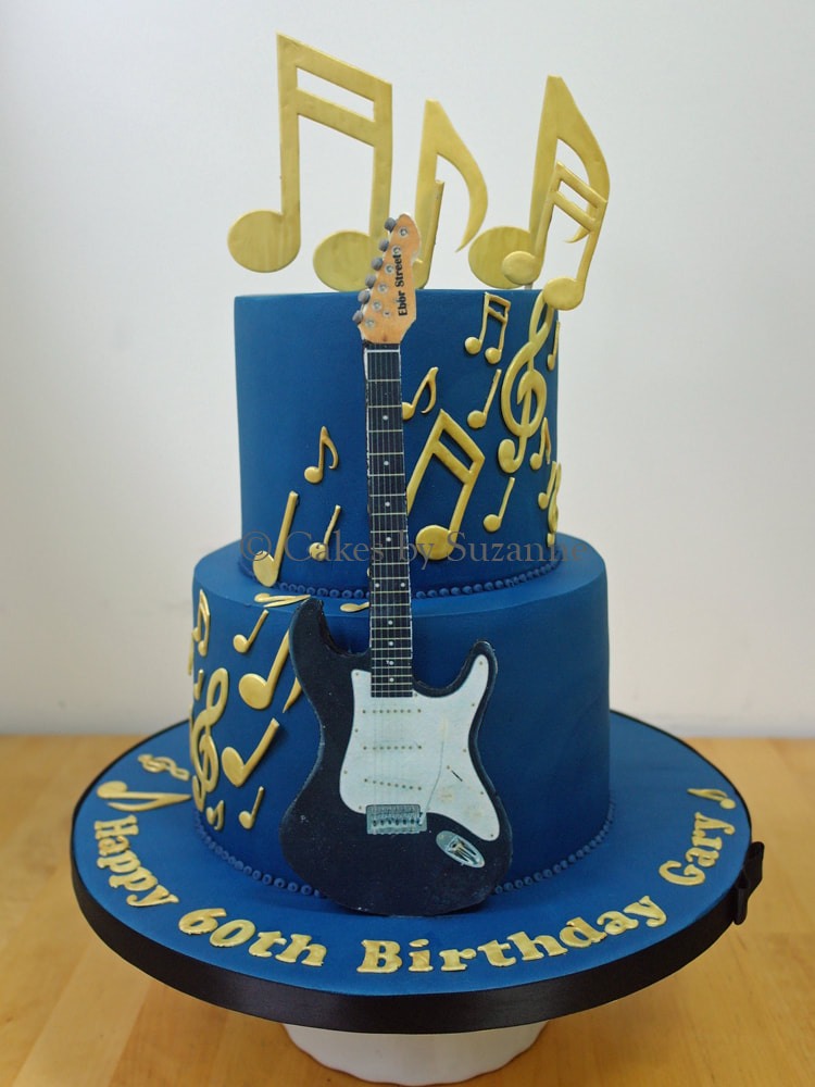 musical themed 60th birthday cake with electric guitar