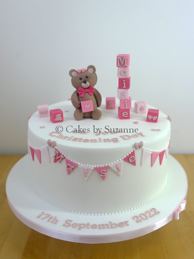 girl/s christening cake with teddy bear, blocks and bunting